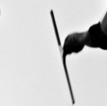 Man cleaning a window with a squeegee